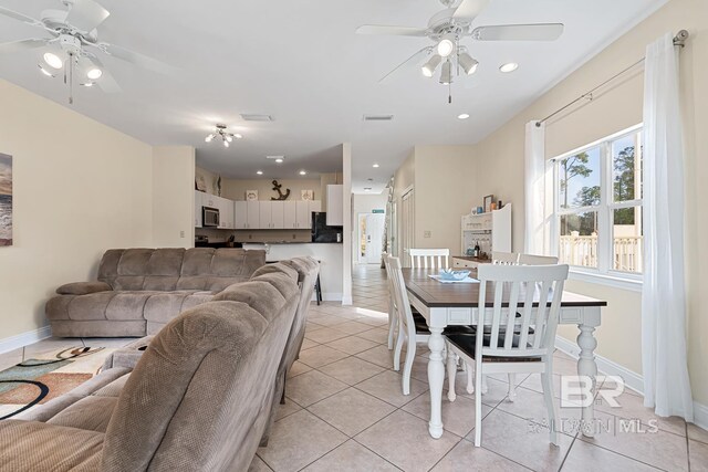 4615 Nancy Ln Unit 8, Orange Beach, AL 36561 - dining room with light tile patterned floors and ceiling fan