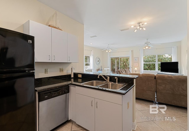 4615 Nancy Ln Unit 8, Orange Beach, AL 36561 - kitchen featuring sink, kitchen peninsula, dishwasher, and black fridge