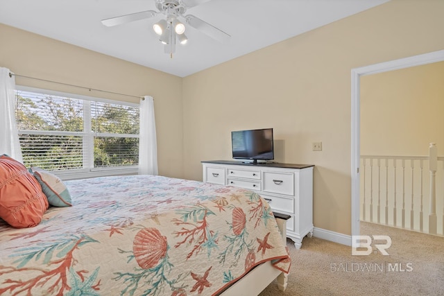 4615 Nancy Ln Unit 8, Orange Beach, AL 36561 - bedroom featuring ceiling fan and light colored carpet