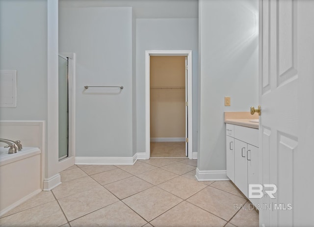 4615 Nancy Ln Unit 8, Orange Beach, AL 36561 - bathroom with vanity, independent shower and bath, and tile patterned flooring