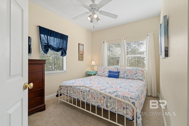 4615 Nancy Ln Unit 8, Orange Beach, AL 36561 - carpeted bedroom featuring ceiling fan