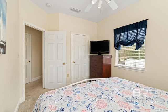 4615 Nancy Ln Unit 8, Orange Beach, AL 36561 - carpeted bedroom featuring ceiling fan