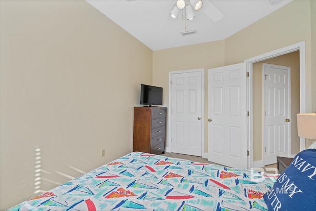 4615 Nancy Ln Unit 8, Orange Beach, AL 36561 - bedroom featuring ceiling fan and light carpet