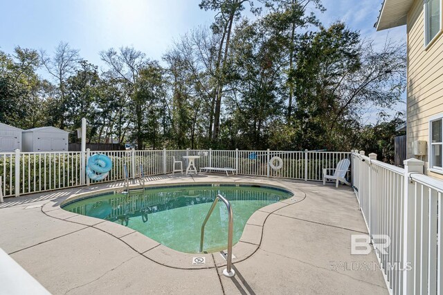 4615 Nancy Ln Unit 8, Orange Beach, AL 36561 - view of pool with a patio
