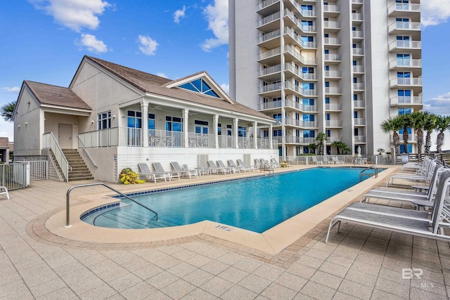 view of pool with a patio