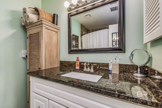 bathroom featuring oversized vanity