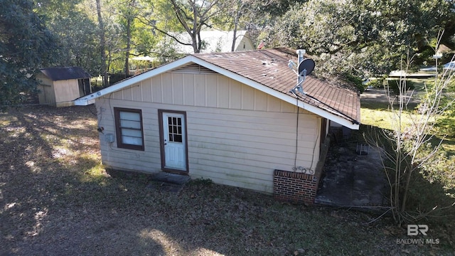 view of outdoor structure featuring central air condition unit