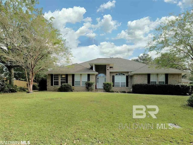 ranch-style house with a front lawn