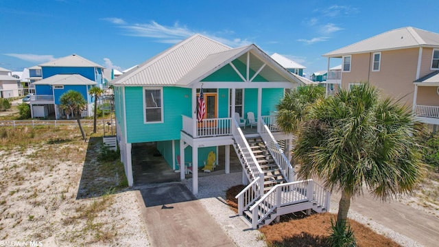 coastal home with covered porch