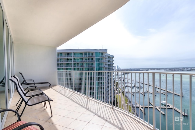 balcony featuring a water view