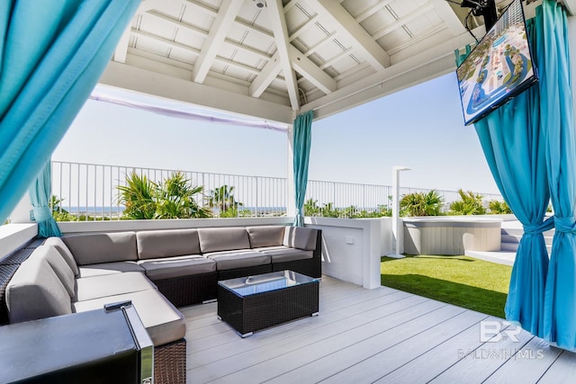 deck featuring an outdoor living space and a gazebo