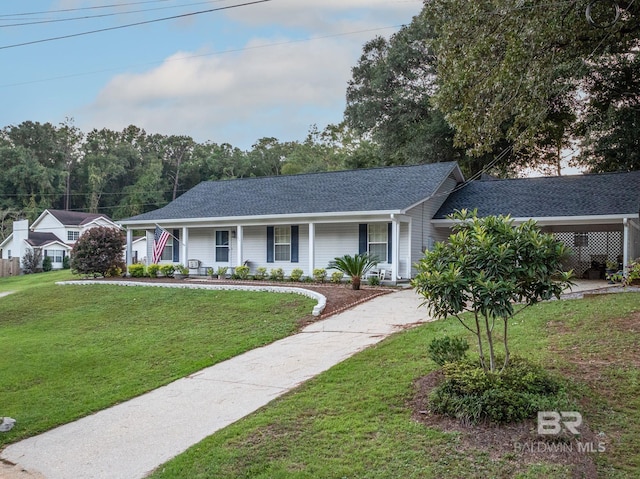 single story home featuring covered porch and a front yard