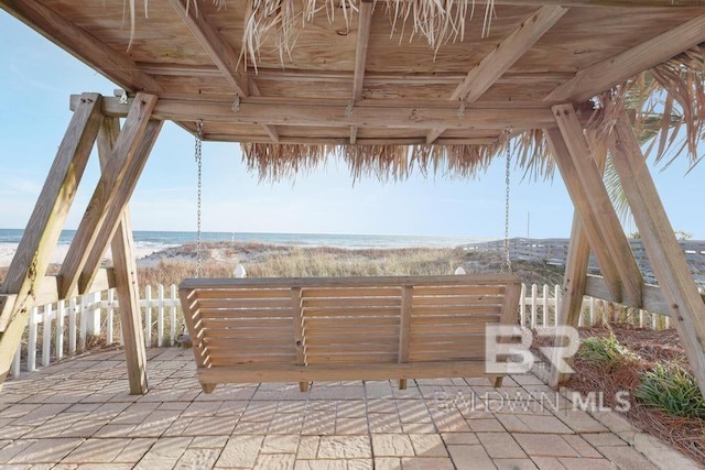 561 E Beach Blvd Unit 208, Gulf Shores, AL 36542 - view of patio / terrace featuring a water view and a view of the beach