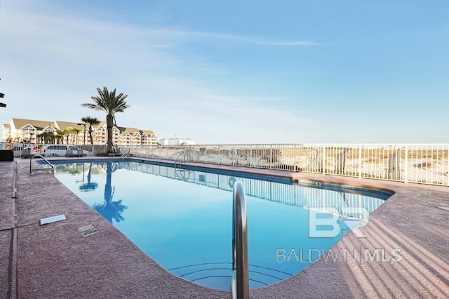 561 E Beach Blvd Unit 208, Gulf Shores, AL 36542 - pool with fence