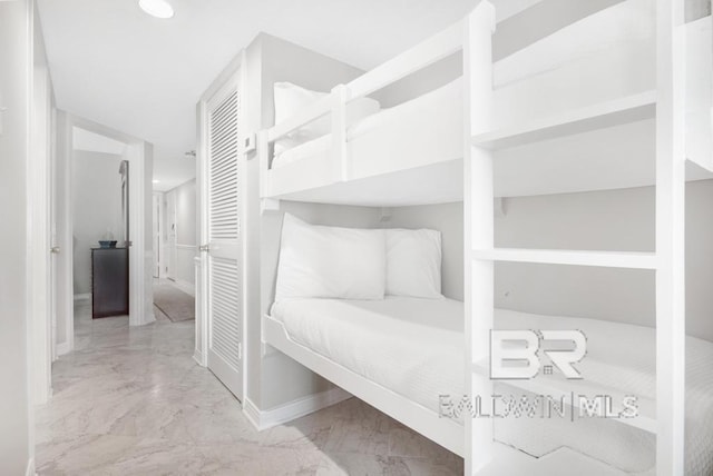 561 E Beach Blvd Unit 208, Gulf Shores, AL 36542 - bedroom featuring recessed lighting, baseboards, and marble finish floor
