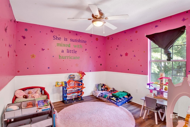 game room with ceiling fan and hardwood / wood-style floors