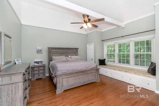 1509 Ridgeland Rd, Mobile, AL 36695 - bedroom with light wood-type flooring, beam ceiling, and ceiling fan