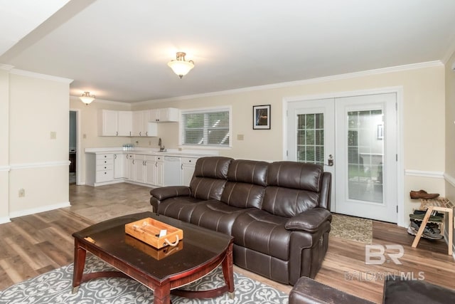 1509 Ridgeland Rd, Mobile, AL 36695 - living area with crown molding, light wood-type flooring, and french doors