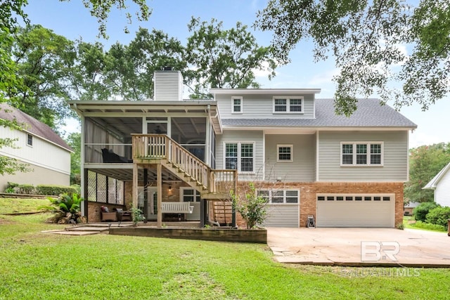 1509 Ridgeland Rd, Mobile, AL 36695 - back of house featuring a sunroom, stairs, brick siding, an attached garage, and concrete driveway