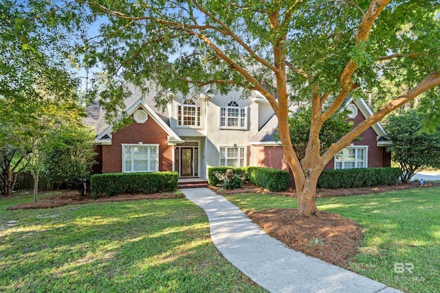 view of front of home featuring a front yard