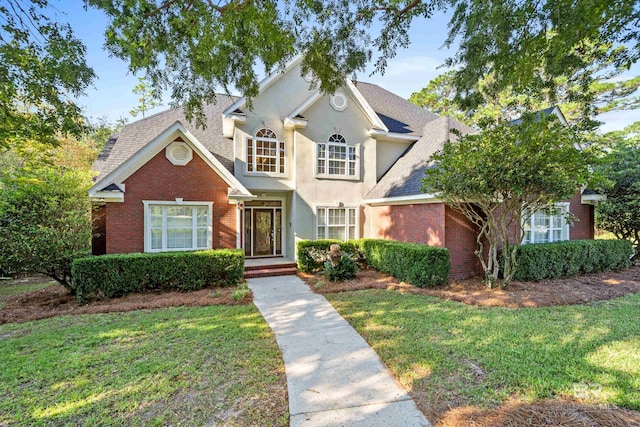 view of front of house with a front lawn