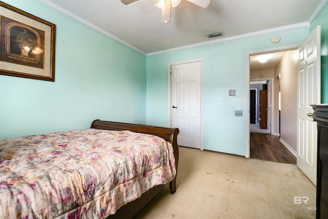 2856 W Saddlebrook Dr, Mobile, AL 36695 - bedroom with ceiling fan, visible vents, light colored carpet, and crown molding