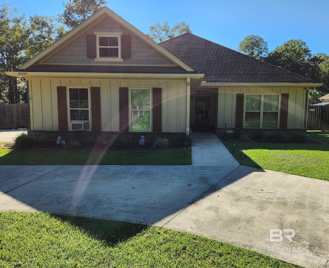 view of front of property with a front lawn