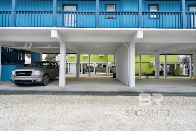 property entrance with a carport