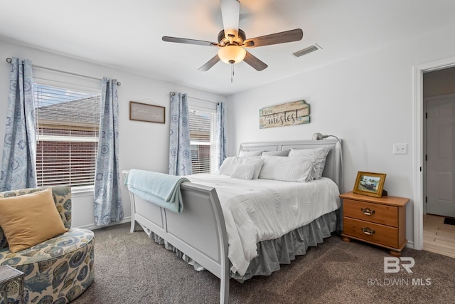 bedroom featuring visible vents, ceiling fan, baseboards, and carpet