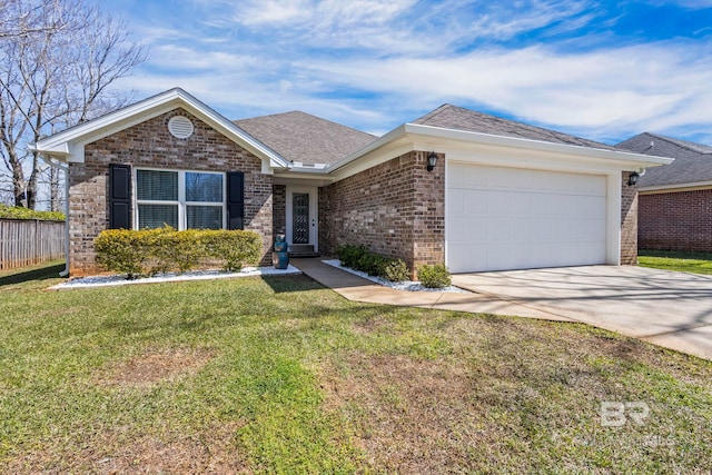 single story home with fence, an attached garage, a front lawn, concrete driveway, and brick siding