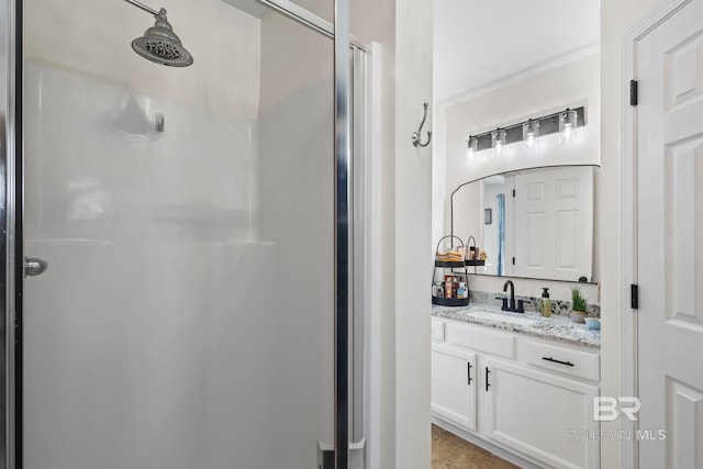 full bathroom with vanity and a shower stall