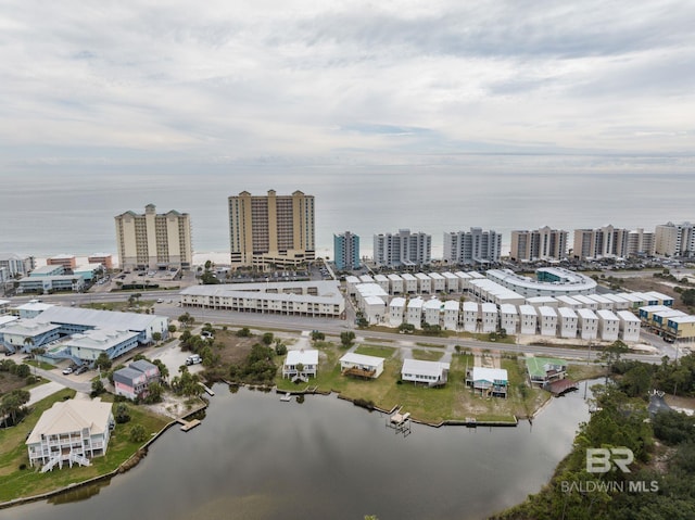 view of urban area featuring a large body of water