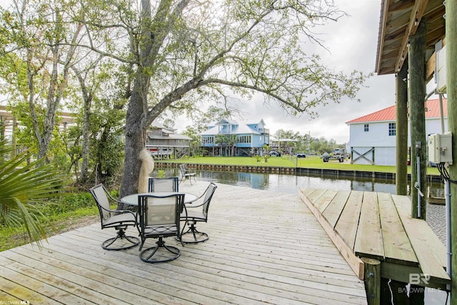13897 Fish River Acres Cir, Foley, AL 36535 - deck with a water view and outdoor dining space