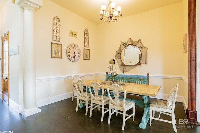 13897 Fish River Acres Cir, Foley, AL 36535 - dining area with finished concrete flooring, a chandelier, ornate columns, and baseboards