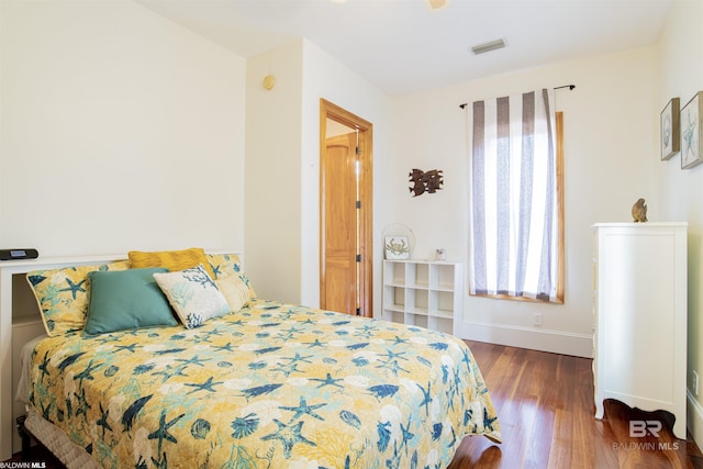 13897 Fish River Acres Cir, Foley, AL 36535 - bedroom featuring wood finished floors and baseboards