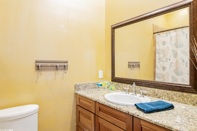 13897 Fish River Acres Cir, Foley, AL 36535 - full bathroom with vanity, toilet, and a shower with shower curtain