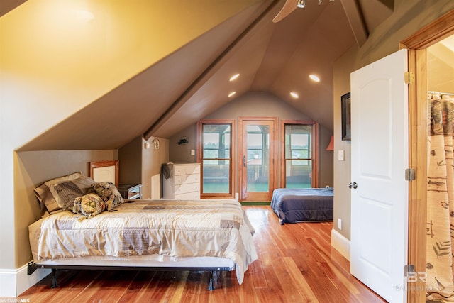 13897 Fish River Acres Cir, Foley, AL 36535 - bedroom with lofted ceiling, wood finished floors, baseboards, recessed lighting, and access to exterior