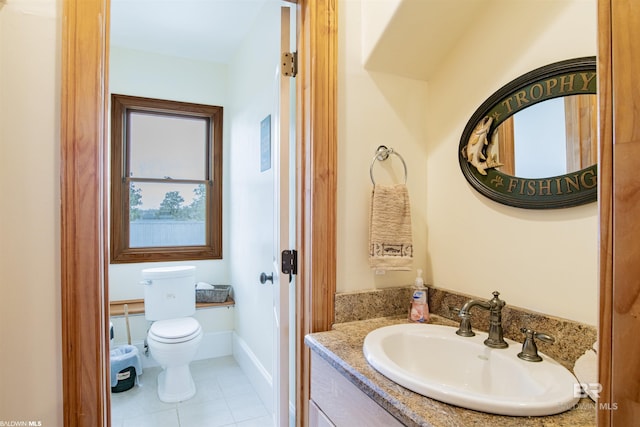 13897 Fish River Acres Cir, Foley, AL 36535 - bathroom with toilet, vanity, and tile patterned floors