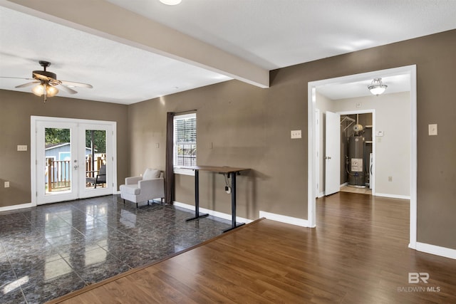 interior space with gas water heater, dark hardwood / wood-style floors, ceiling fan, beam ceiling, and french doors