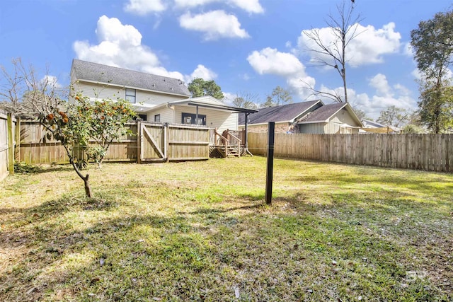 view of yard featuring a deck