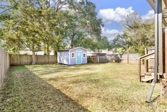 view of yard with a storage shed