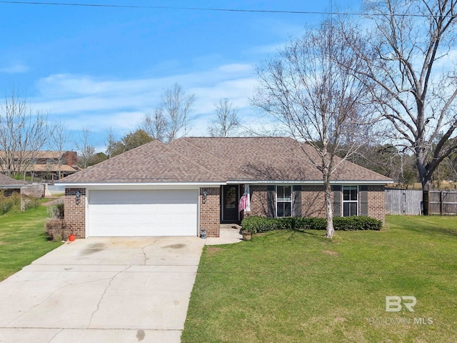 ranch-style home featuring brick siding, a garage, driveway, and a front yard