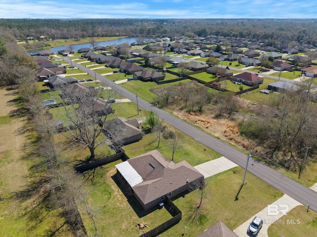 bird's eye view featuring a residential view and a water view