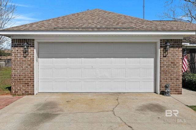 garage featuring driveway