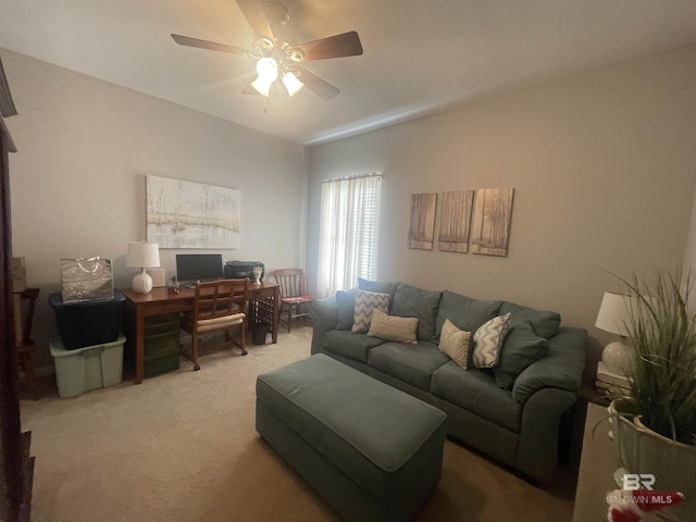 carpeted living room featuring ceiling fan