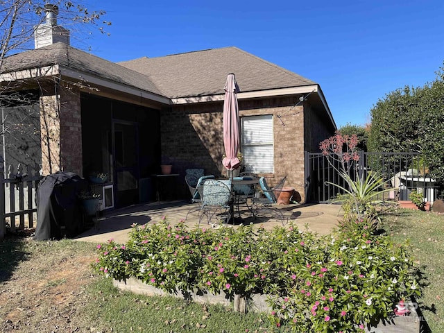 back of house featuring a patio area