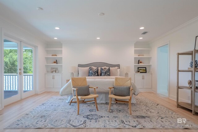 bedroom featuring access to exterior, ornamental molding, light wood-type flooring, and french doors