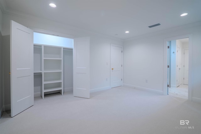 unfurnished bedroom featuring ornamental molding and light carpet