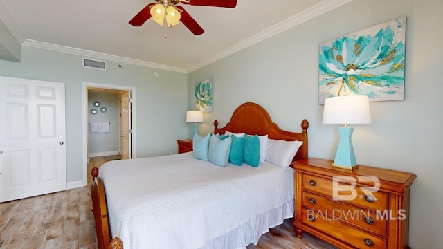 375 Beach Club Trl Unit A-1608, Gulf Shores, AL 36542 - bedroom featuring ornamental molding, wood finished floors, a ceiling fan, and baseboards
