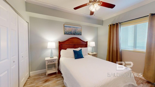 375 Beach Club Trl Unit A-1608, Gulf Shores, AL 36542 - bedroom featuring crown molding, a closet, baseboards, light wood finished floors, and ceiling fan